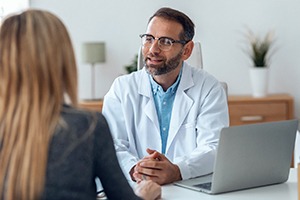 patient having dental implant consultation
