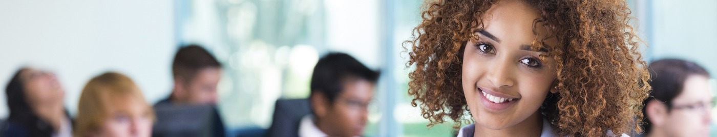 Woman smiling in classroom